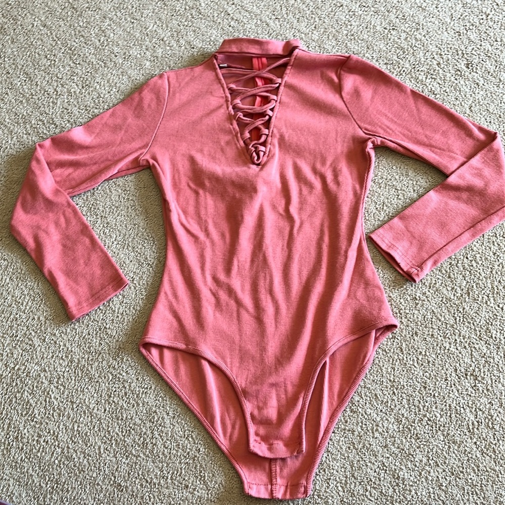 Criss cross bodysuit with button snap